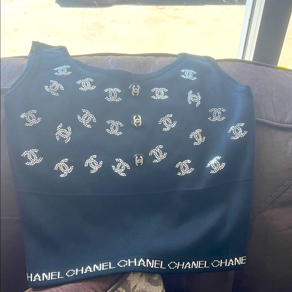 CHANEL Black Top with Silver Logo Embellishments
